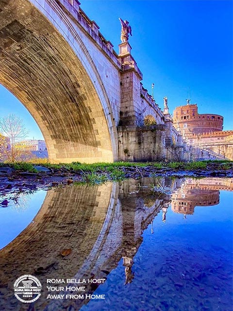 Cây cầu Thiên thần và lâu đài Thiên thần cùng nghiêng bóng xuống sống Tevere